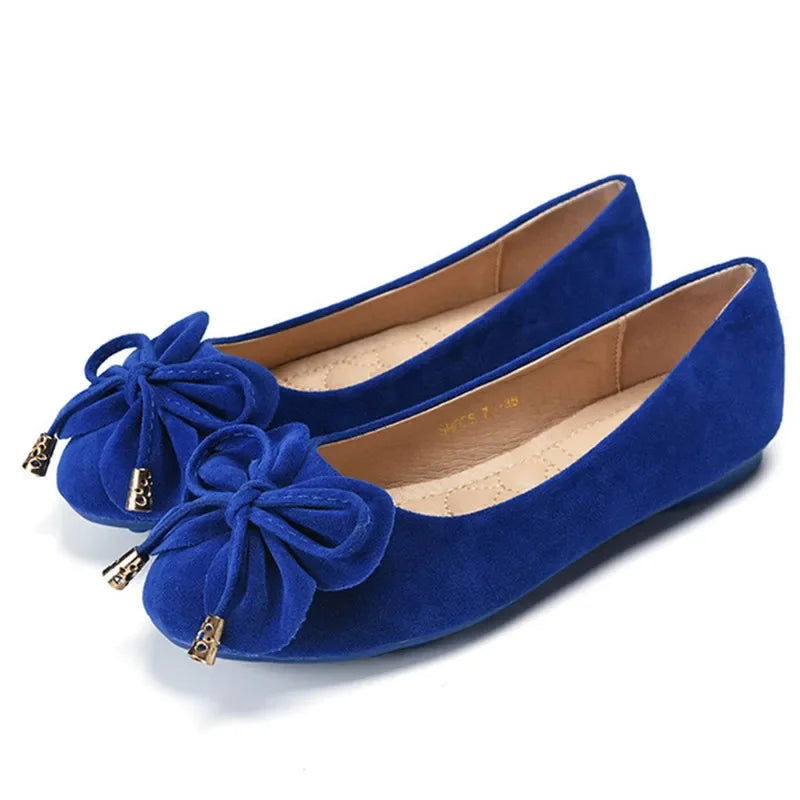 Vue arrière des ballerines montrant les finitions dorées