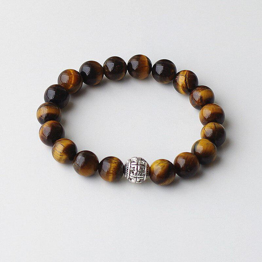 Bracelet extensible avec perles marron et dorées