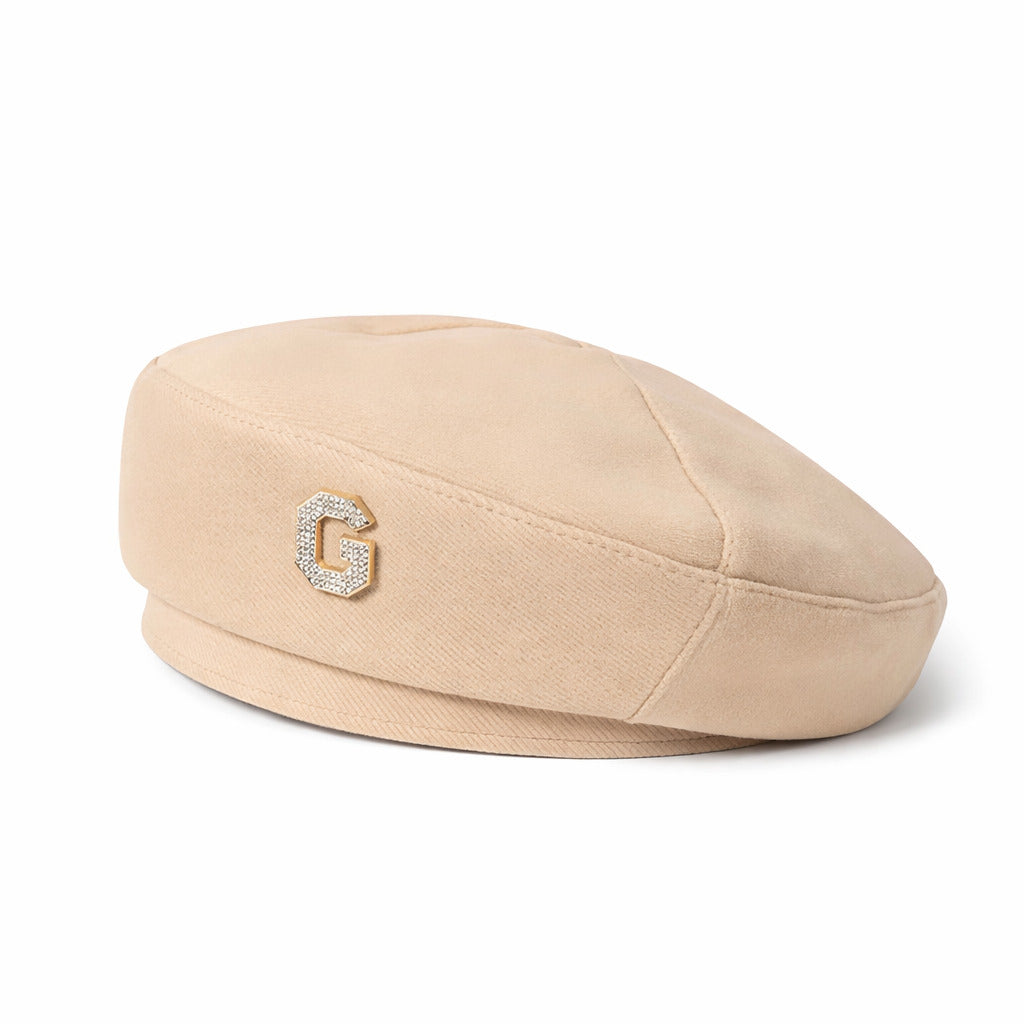 Béret en laine avec motif classique, fond neutre