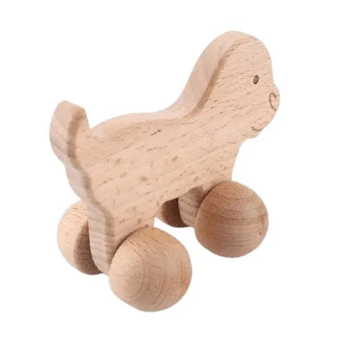 Vue latérale du hochet chien en bois pour bébé