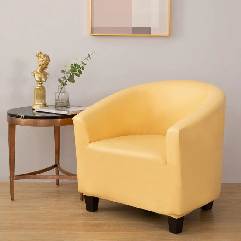 Housse jaune en simili cuir sur fauteuil cabriolet