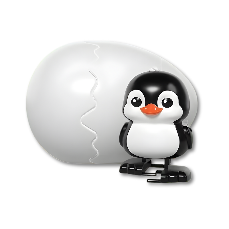 Pingouin enjoué apparaissant d'un œuf à remonter