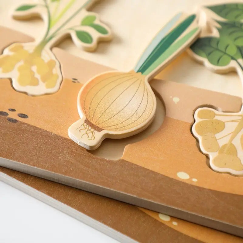 Puzzle en bois avec pièces de légumes souterrains colorés
