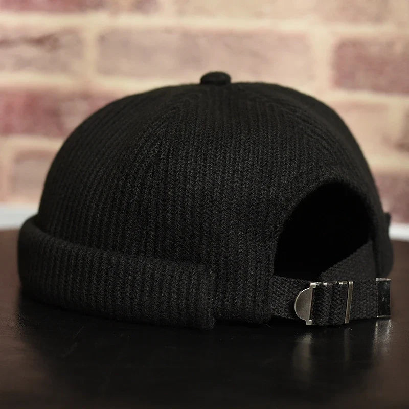 Bonnet Docker plié, montrant la texture côtelée