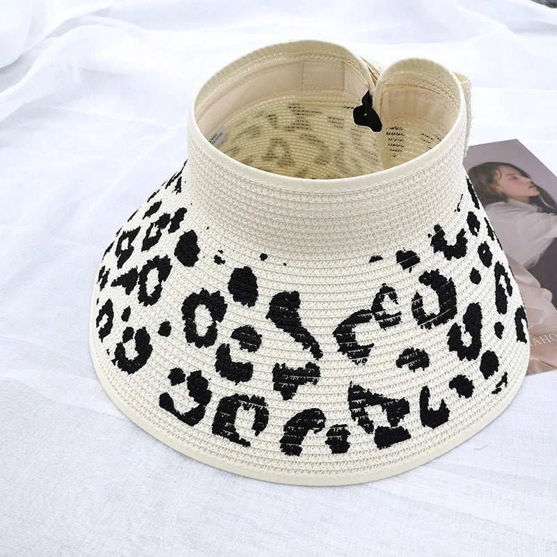 Chapeau de paille porté, protection solaire et style estival