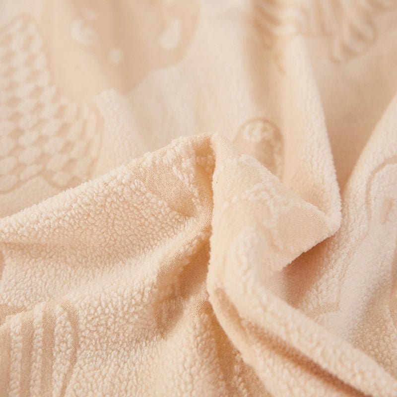Housse polaire extensible adaptée à un coussin de canapé