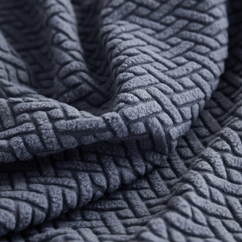 Coussin enveloppé de housse polaire, couleur bleue marine