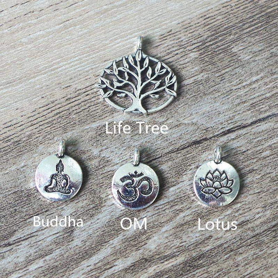 Bracelet élégant avec perles et symbole Bouddha gravé