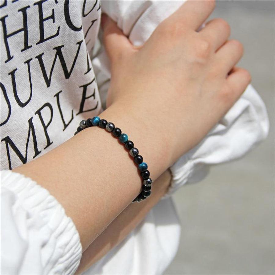 Bracelet en Lapis Lazuli et Obsidienne sur fond blanc