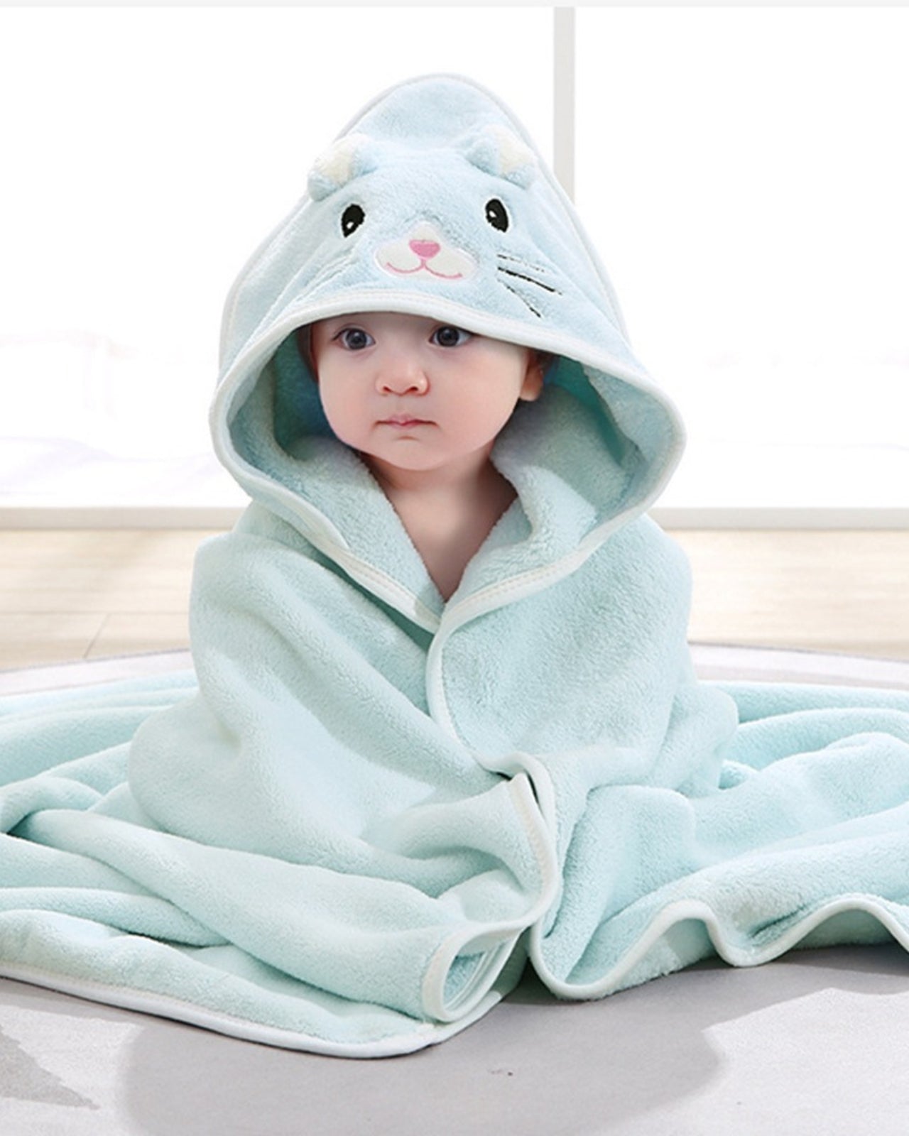 Cape de bain bébé chien bleu 0-3 ans