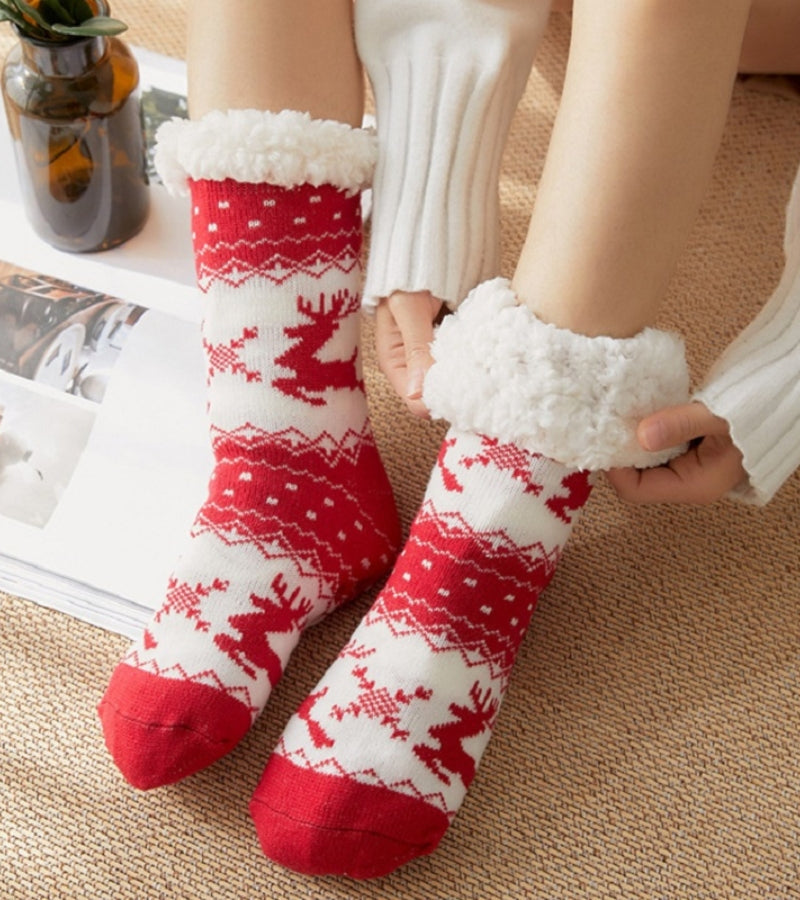 Chaussettes rouges de Noël avec motifs festifs et semelle antidérapante