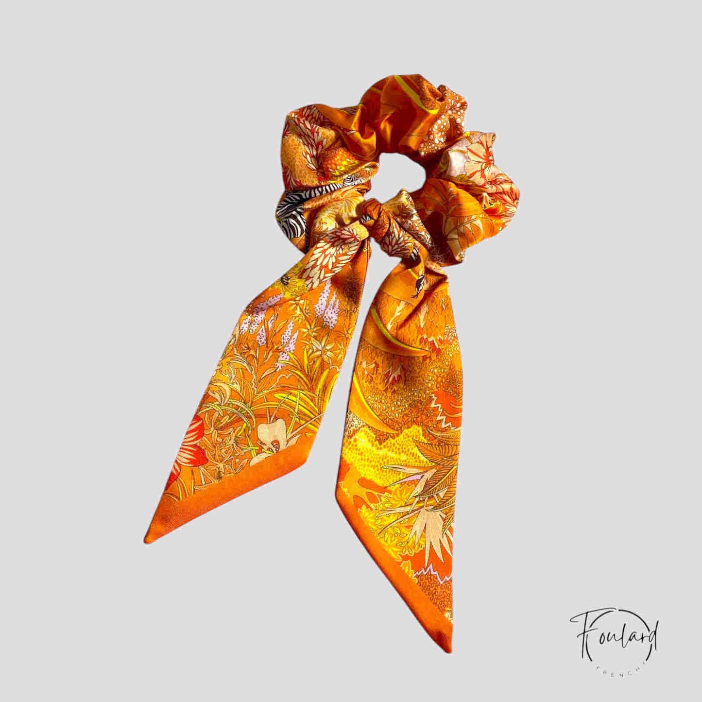 Chouchou foulard orange avec motifs tropicaux floraux