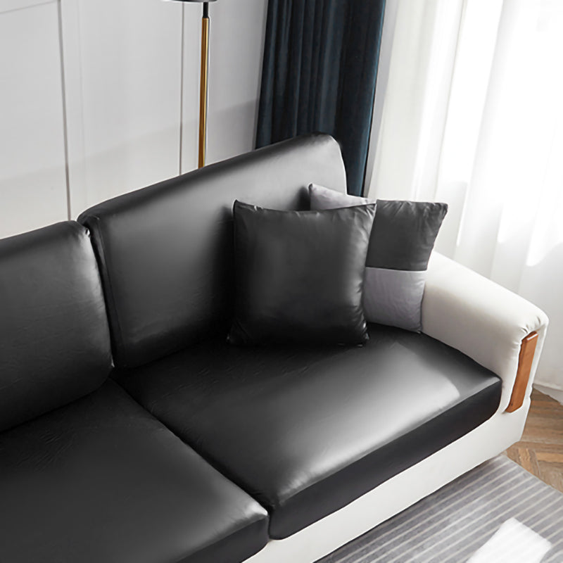 Housse de coussin en simili cuir imperméable sur canapé moderne