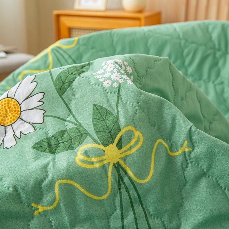 Drap housse imperméable plié, prêt à être rangé