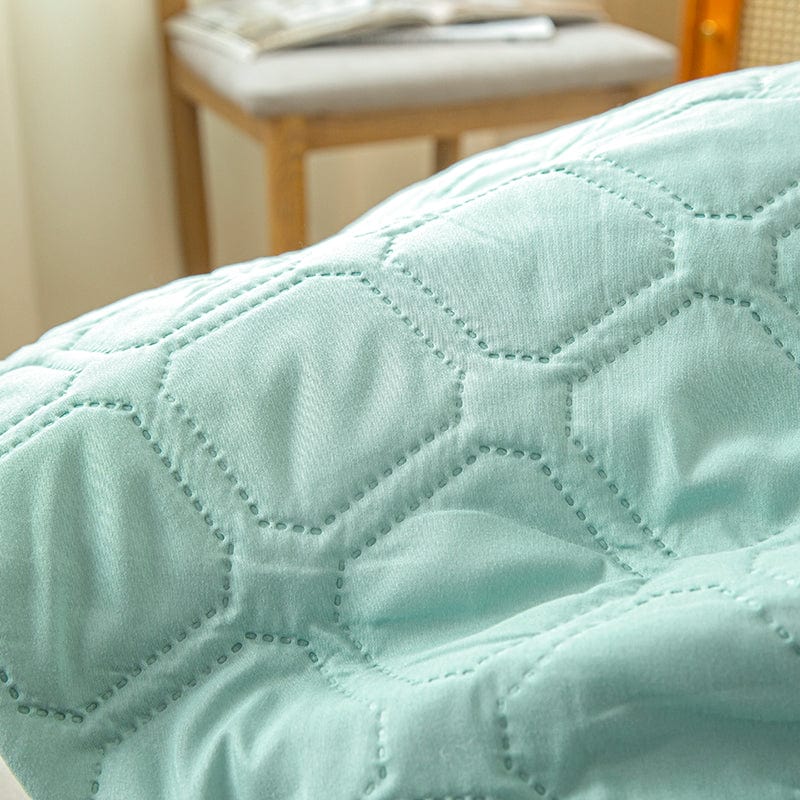 Drap housse imperméable plié, prêt à ranger