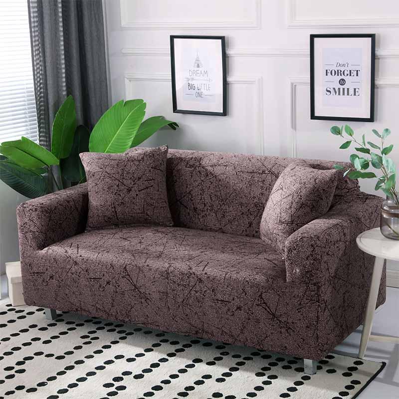 Housse de canapé marron extensible sur un canapé droit