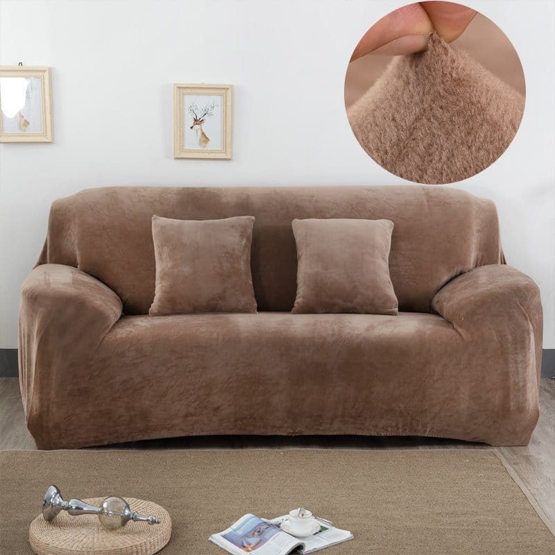 Canapé recouvert de housse extensible en velours