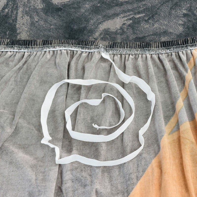 Zoom sur les coutures renforcées de la housse orange