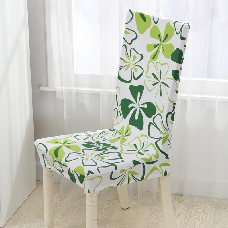 Housse de chaise verte motif trèfle sur chaise standard