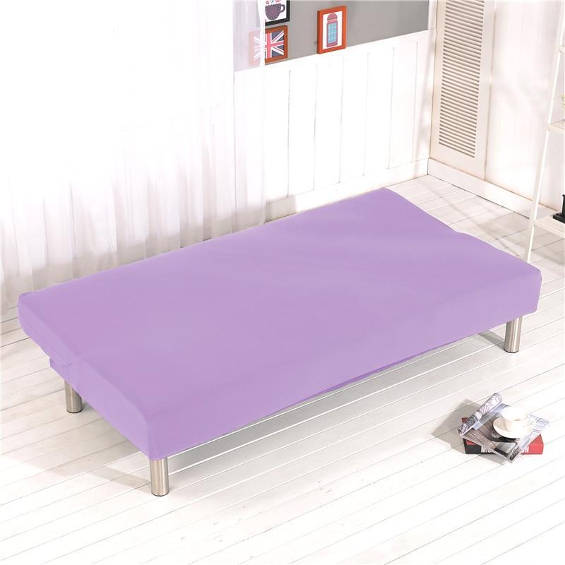 Housse extensible montrée sur canapé-lit partiellement ouvert