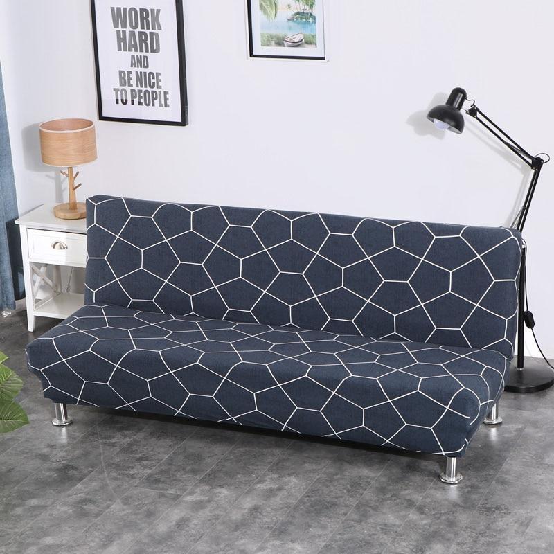 Housse extensible grise sur canapé-lit clic-clac en position ouverte