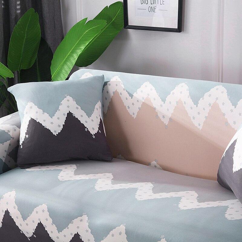 Housses de coussin extensibles grises sur canapé moderne
