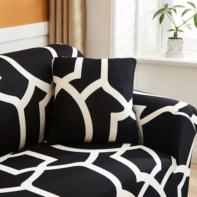 Deux housses de coussin noires extensibles sur fond blanc