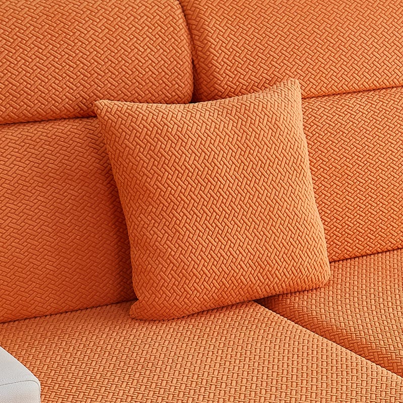 Housse de coussin orange en laine avec motif géométrique