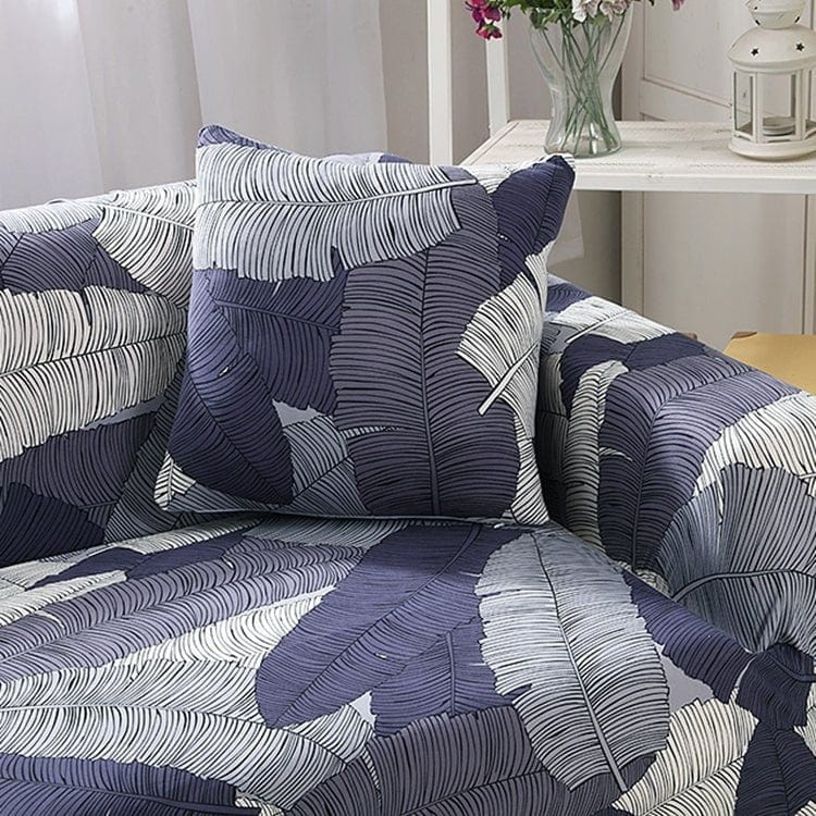 Deux housses de coussin extensibles avec motif de feuilles tropicales