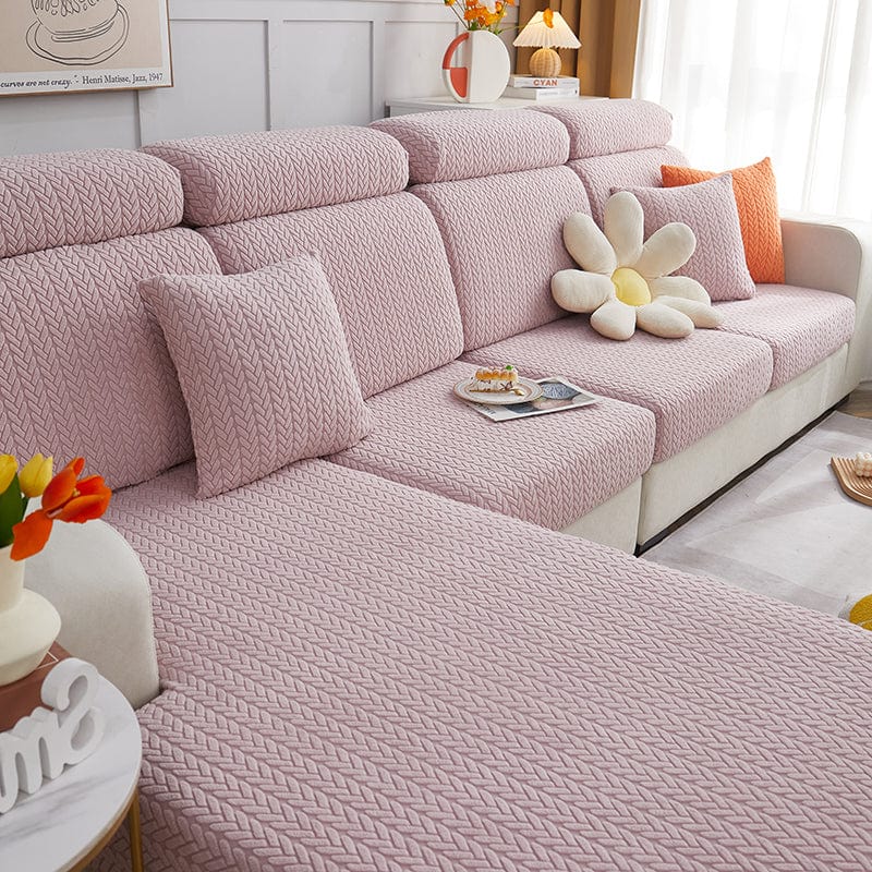 Housse de coussin en laine rose clair avec motifs géométriques