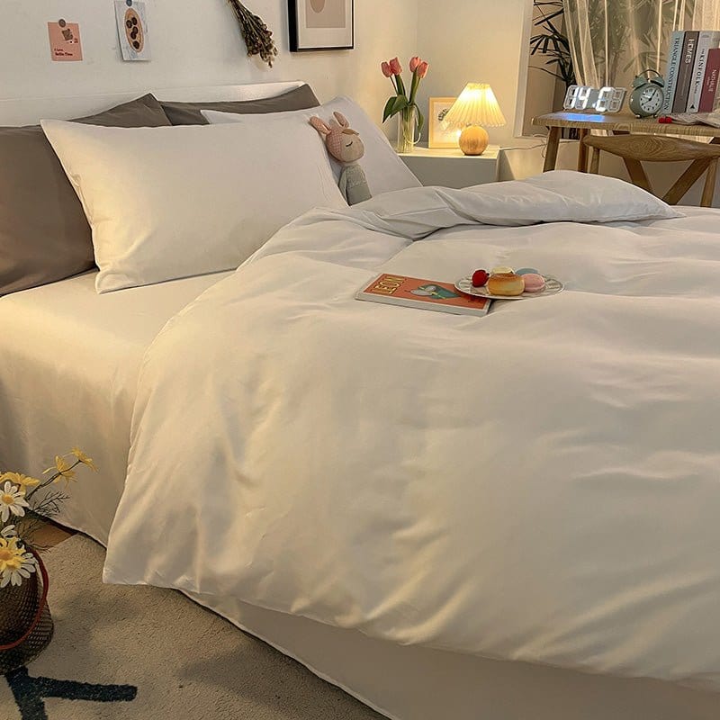 Housse de couette blanche avec oreillers assortis