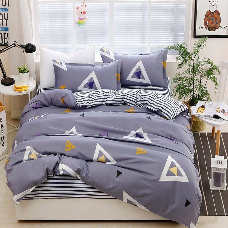 Housse de couette en polyester sur un lit bien fait