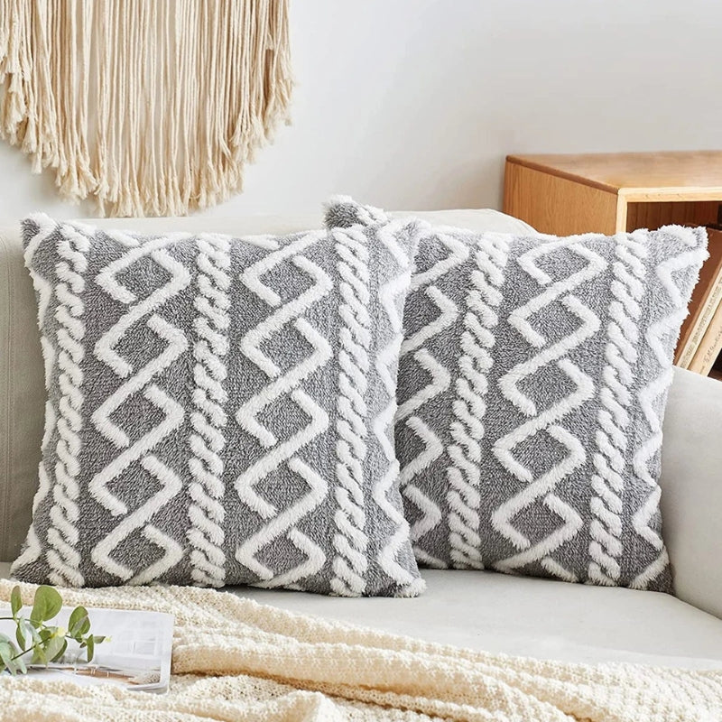 Housse de coussin grise et blanche en Pilou Pilou croisé