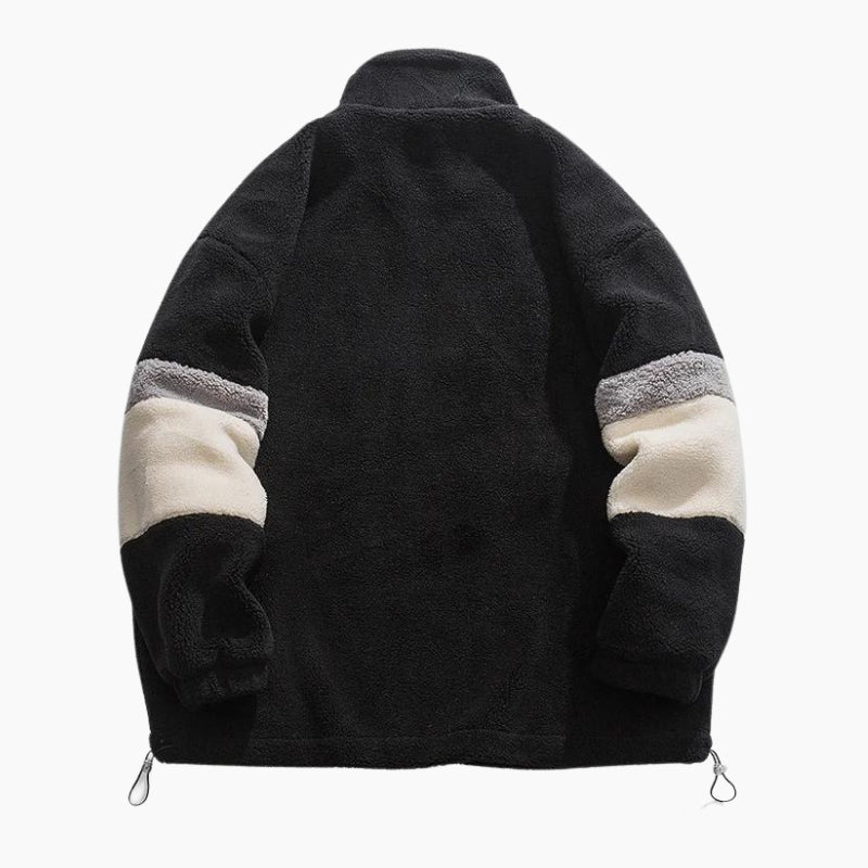 Veste noire en matière mouton avec bande contrastée