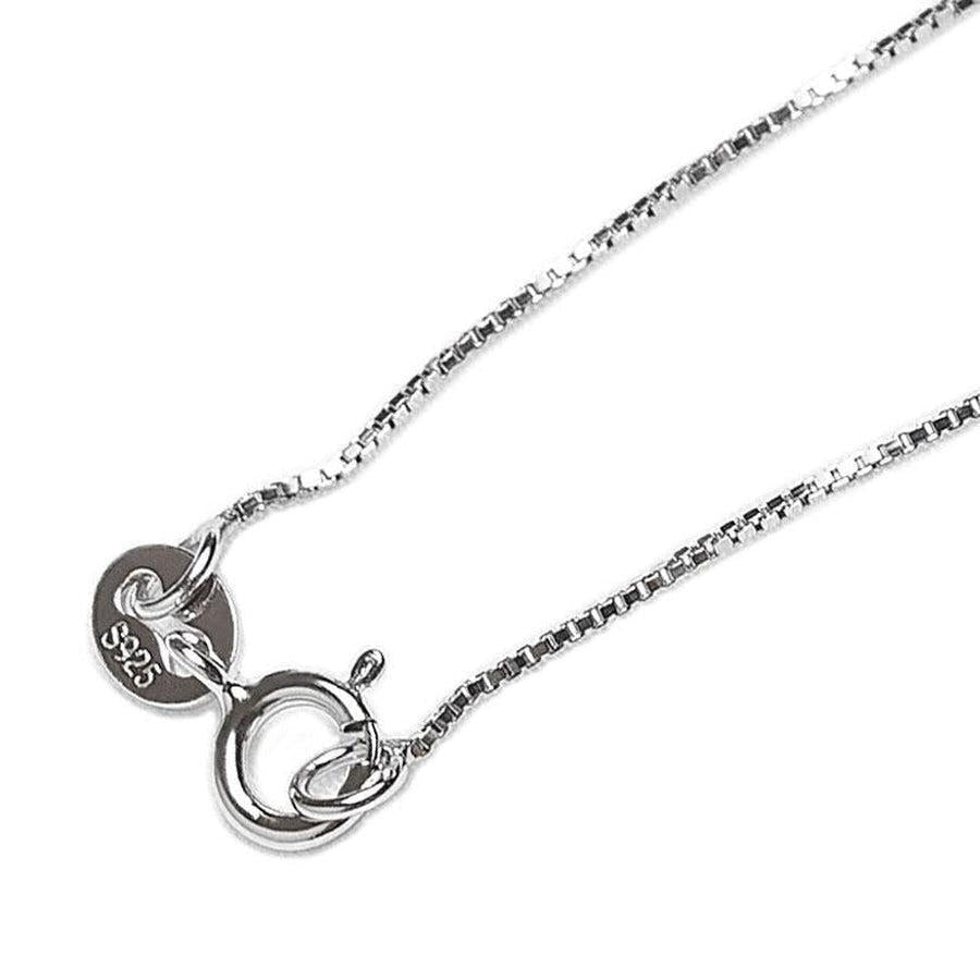 Pendentif argenté avec symboles spirituels gravés