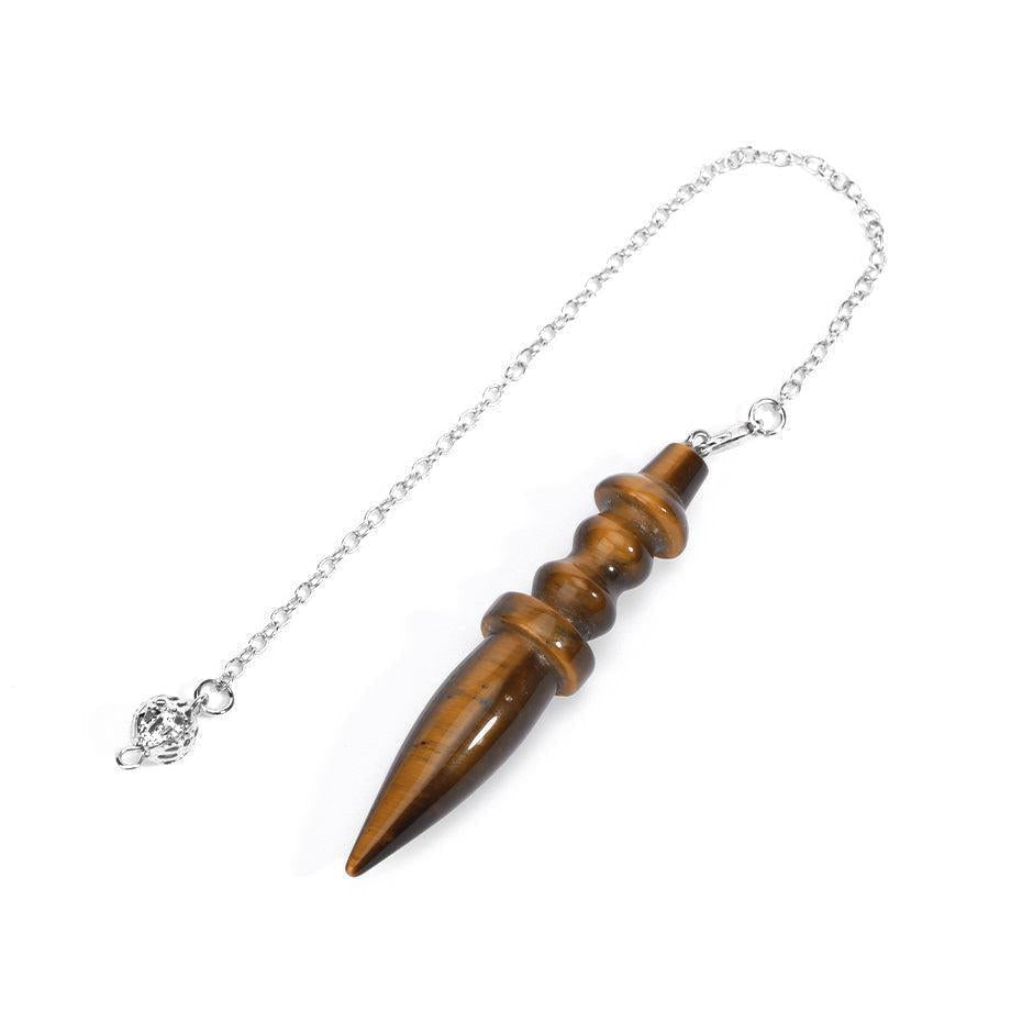 Collection de pendules en pierres variées sur fond neutre