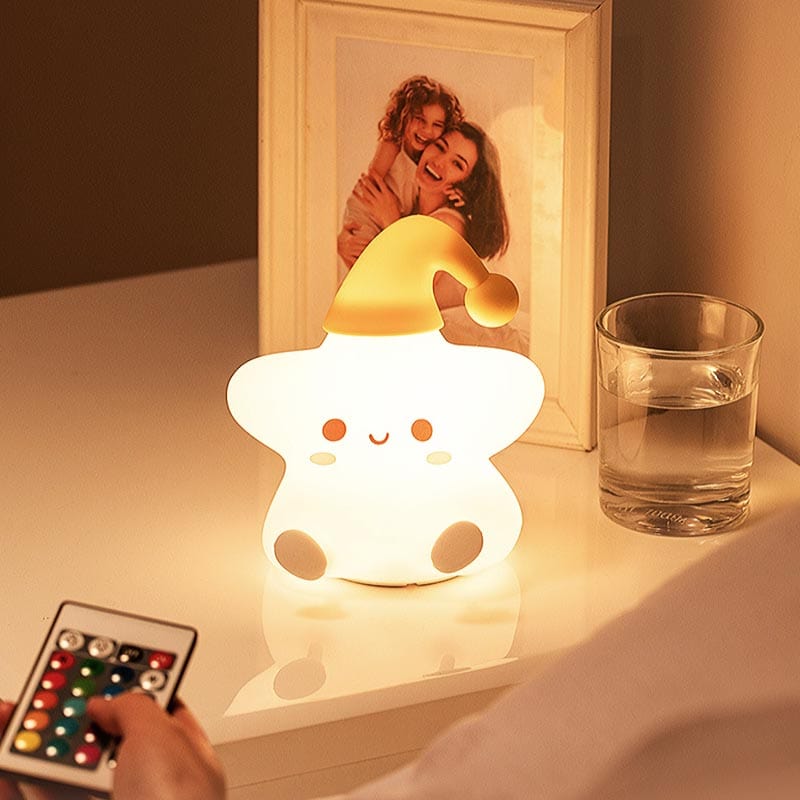 Veilleuse étoile LED montrant ses différentes couleurs apaisantes