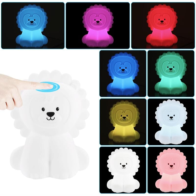 Veilleuse lion LED multicolore sur table de nuit