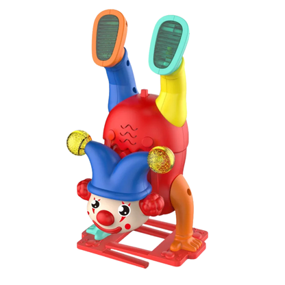 Jouet clown en mouvement, lumière et musique en action