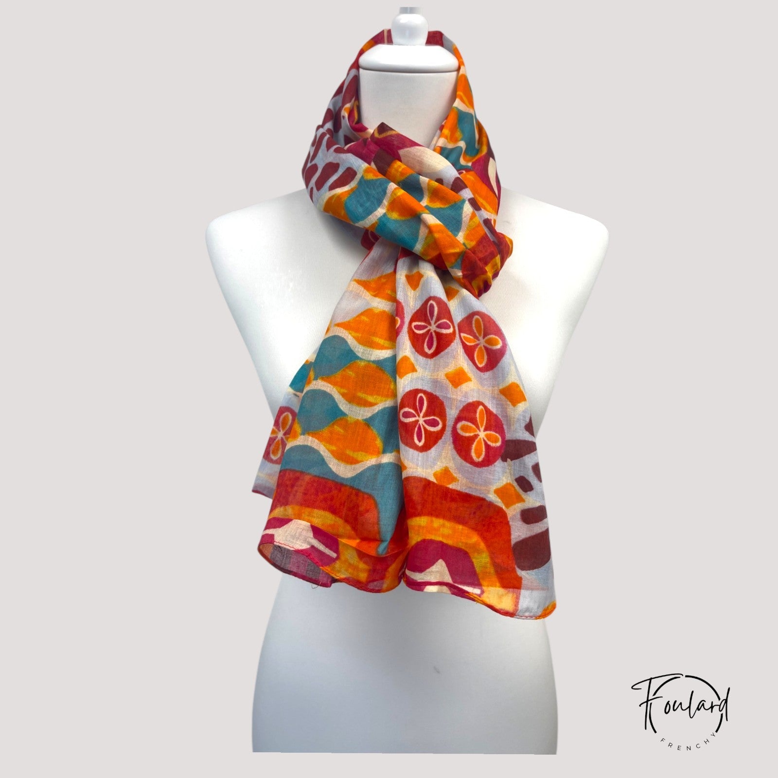 Foulard multicolore avec motifs géométriques en coton