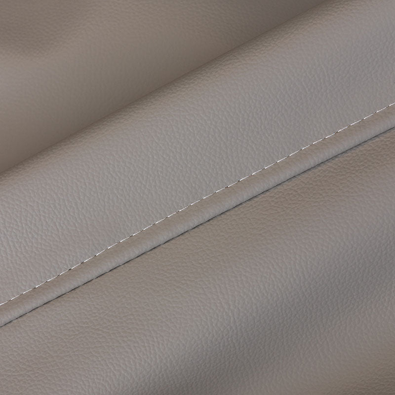 Jeté de canapé beige facile à nettoyer avec une éponge