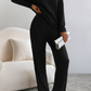 Ensemble pyjama tricoté doux sur mannequin assis