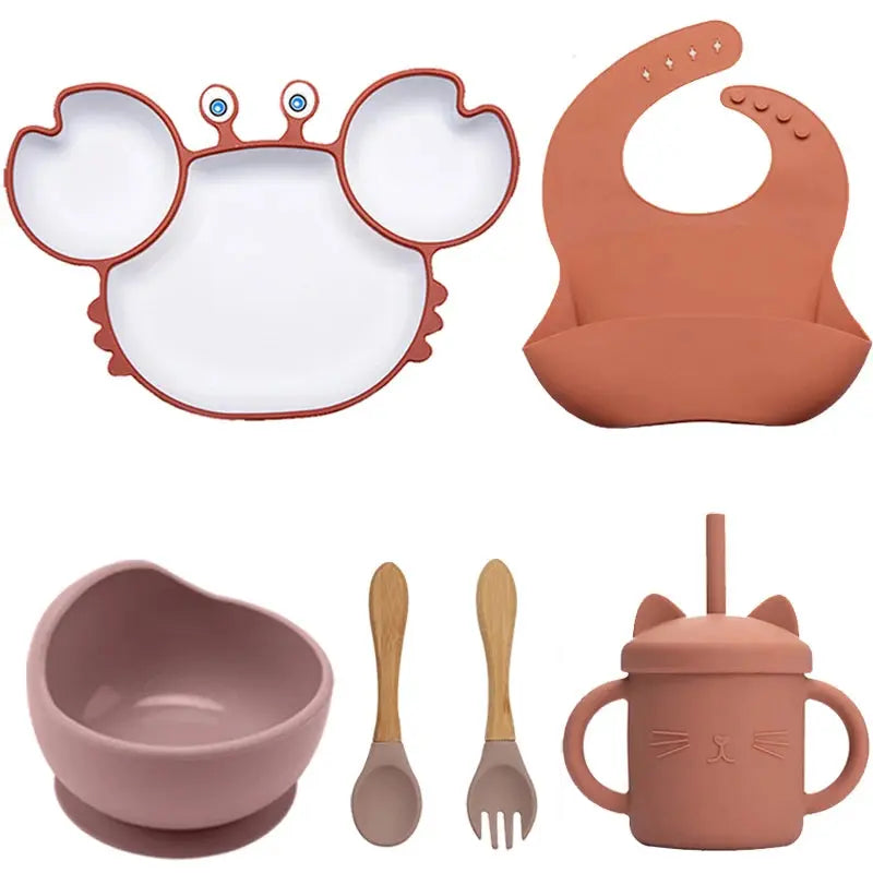 Assiette crabe avec trois sections pour repas équilibré