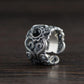 Bague ouverte en argent avec pierre noire centrale