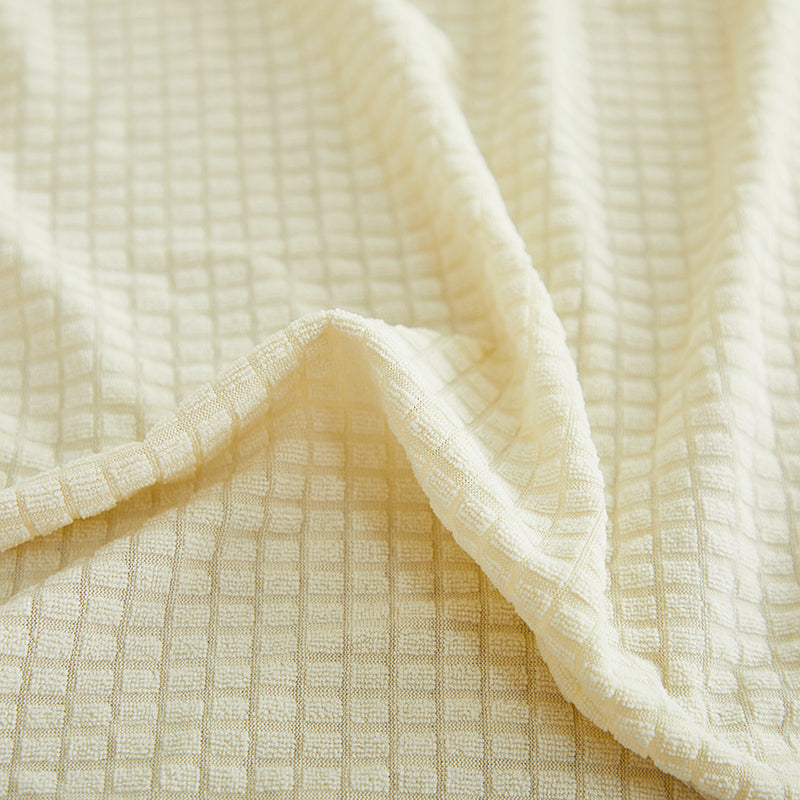 Vue latérale de la housse sur un coussin