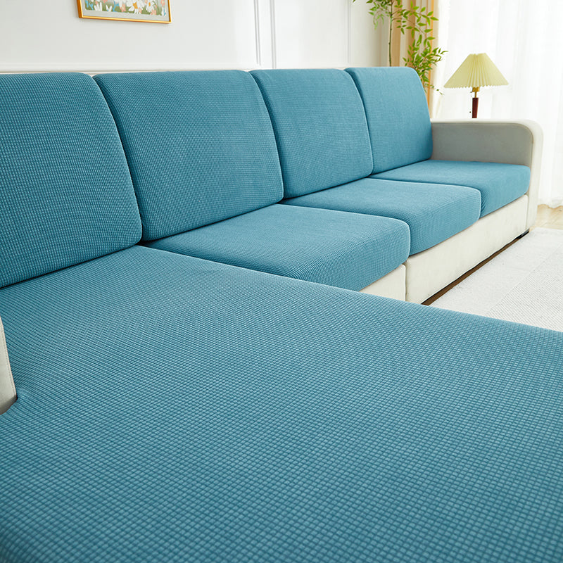 Gros plan sur la texture jacquard de la housse bleue ciel