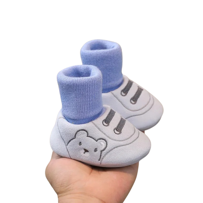 Chaussures bébé bleues en tissu ultra doux