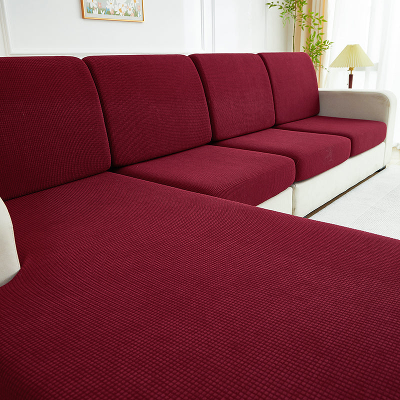 Détail du tissu jacquard bordeaux, motif élégant