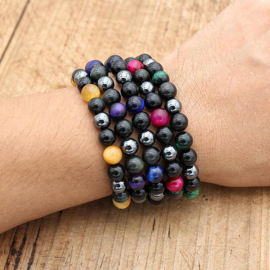 Bracelet en Oeil de Tigre et Obsidienne sur fond blanc