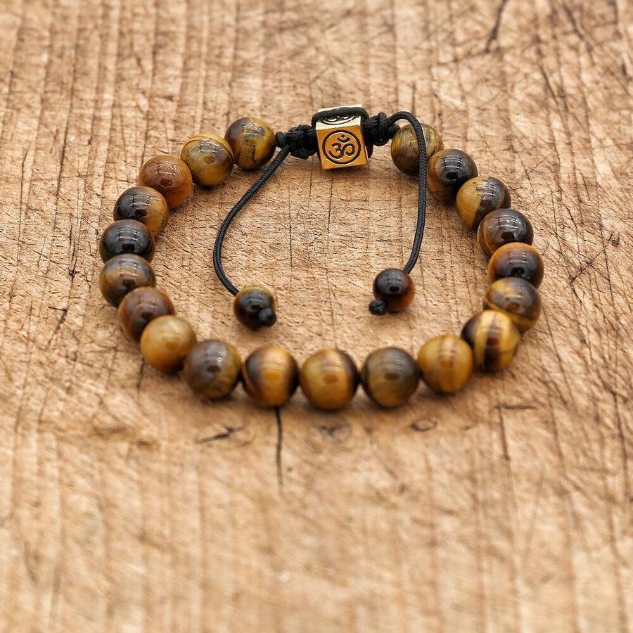 Gros plan sur les perles d'Œil de Tigre du bracelet